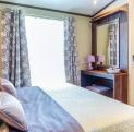 Pemberton Rivington for sale at Arrow Bank 5 star caravan park, Herefordshire - master bedroom photo